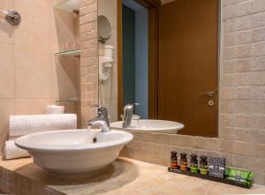 Koupelna v ubytování Kastalia Boutique Hotel