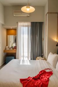 Postel nebo postele na pokoji v ubytování Kastalia Boutique Hotel