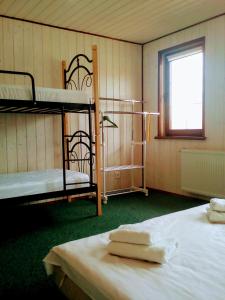 Postel nebo postele na pokoji v ubytování Hotel Galushko