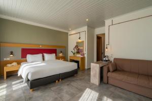 Postel nebo postele na pokoji v ubytování Kastalia Boutique Hotel