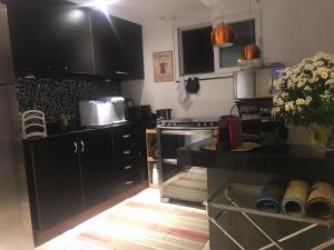 Kuchyň nebo kuchyňský kout v ubytování Laguna Hostel