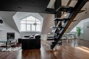 Μια τηλεόραση ή/και κέντρο ψυχαγωγίας στο Oktheway Loft Maestranza