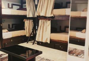 Ένα ή περισσότερα κρεβάτια σε δωμάτιο στο Castle Hostel