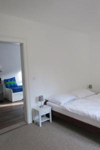 Postel nebo postele na pokoji v ubytování Ubytování v soukromí - Apartmán MERAN