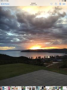 a view of the sunset from the top of a building at The Gallery in Taupo