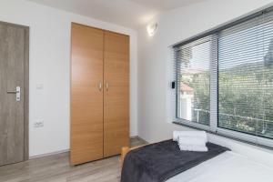 Posteľ alebo postele v izbe v ubytovaní Apartment LORO