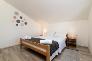 Posteľ alebo postele v izbe v ubytovaní Apartment LORO