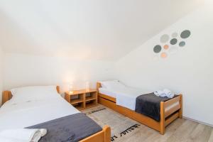 Posteľ alebo postele v izbe v ubytovaní Apartment LORO