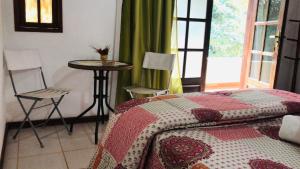 Cama ou camas em um quarto em Pousada Cabanas da Serra Lumiar mais 37 fotos