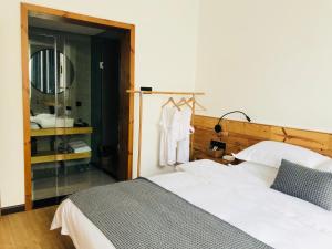 Postel nebo postele na pokoji v ubytování BaHaoBieYuan