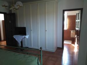 Postel nebo postele na pokoji v ubytování B&B Villa Le Palme Scalea