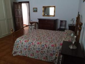 Postel nebo postele na pokoji v ubytování B&B Villa Le Palme Scalea