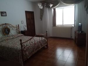Postel nebo postele na pokoji v ubytování B&B Villa Le Palme Scalea + 23 fotografií