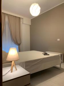 A bed or beds in a room at Casa vacanze Circle House Santa Filomena