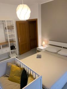 A bed or beds in a room at Casa vacanze Circle House Santa Filomena