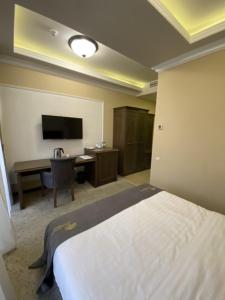 Televisyen dan/atau pusat hiburan di Boulevard Hotel