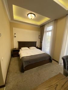Katil atau katil-katil dalam bilik di Boulevard Hotel