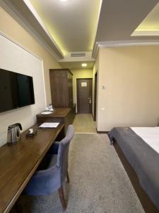 Katil atau katil-katil dalam bilik di Boulevard Hotel