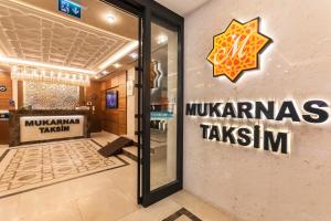 a store front with a star on the wall at Mukarnas Taksim Hotel in Istanbul