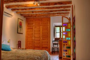 A bed or beds in a room at Finca el Regalo Még 37 kép