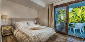 Ein Bett oder Betten in einem Zimmer der Unterkunft Hotel Pilalidis
