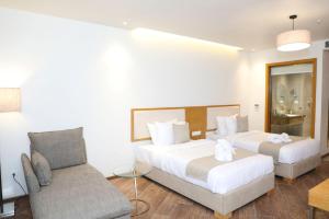 The Fern Residency, Morbi客房内的一张或多张床位