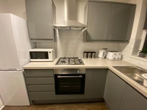 Dapur atau dapur kecil di Apartment 20 @ Excel London