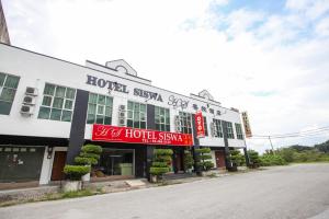 Foto da galeria de OYO 89539 Hotel Siswa em Kampar