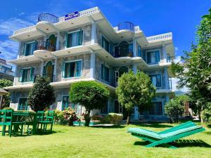 Garður fyrir utan Hotel Noble Inn花椒客栈