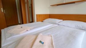 Posteľ alebo postele v izbe v ubytovaní Horský Hotel Neptun
