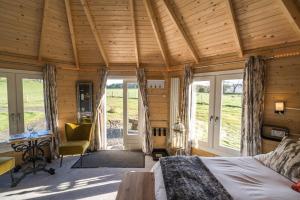 Postel nebo postele na pokoji v ubytování Dunroamin Lodges