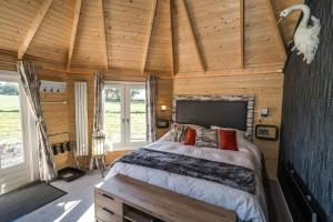 Postel nebo postele na pokoji v ubytování Dunroamin Lodges