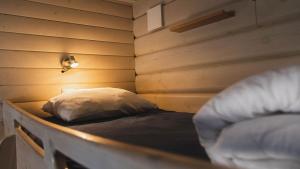 Voodi või voodid majutusasutuse Karlstad Swecamp Bomstadbaden toas