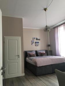 Postel nebo postele na pokoji v ubytování Villa Rosa Bad Camberg