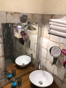 Et badeværelse på Donna Margherita Appartamento