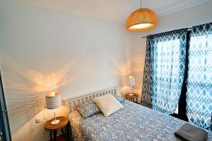 A bed or beds in a room at Arena Blanca