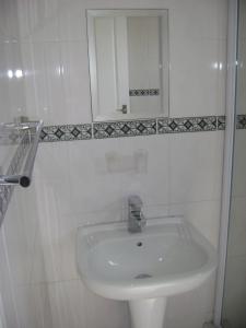 Ванная комната в North Beach Durban Apartments