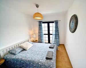 A bed or beds in a room at Arena Blanca