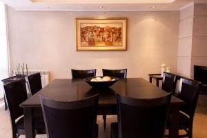 Uma área de estar em Argentino Hotel