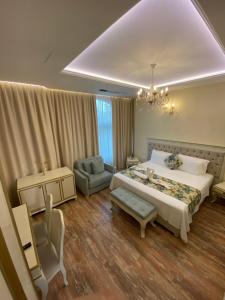 Ліжко або ліжка в номері The Red Bricks Hotel