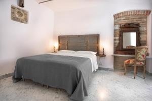 Postel nebo postele na pokoji v ubytování Carrara Bella