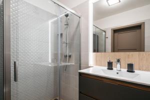 Vonios kambarys apgyvendinimo įstaigoje Garden Apartments by LoftAffair
