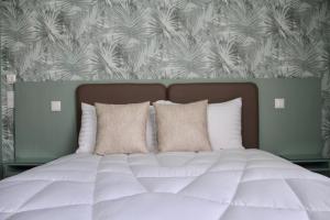 Postel nebo postele na pokoji v ubytování A Rendilheira Boutique Hotel