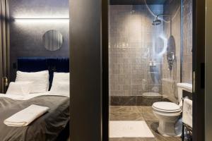 Koupelna v ubytování Noble Boutique Hotel - Adults Only + 37 fotografií