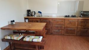 Kuchyň nebo kuchyňský kout v ubytování Tamarin Loft Apartment