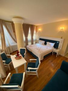 Ліжко або ліжка в номері The Red Bricks Hotel