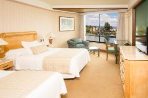 Postel nebo postele na pokoji v ubytování Hotel Marina Villa del Rio
