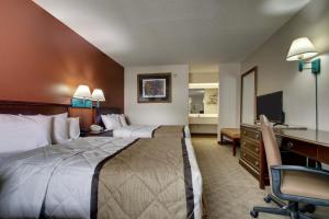 Katil atau katil-katil dalam bilik di Key West Inn - LaFayette