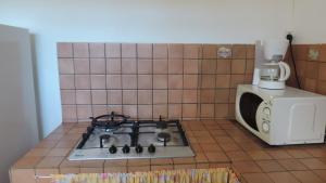 Kuchyň nebo kuchyňský kout v ubytování Chez Régine + 6 fotografií