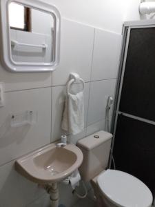 Um banheiro em Pousada Fragata